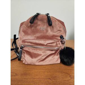 Guess small velvet feel pink backpack with black straps and pom. Measures approx